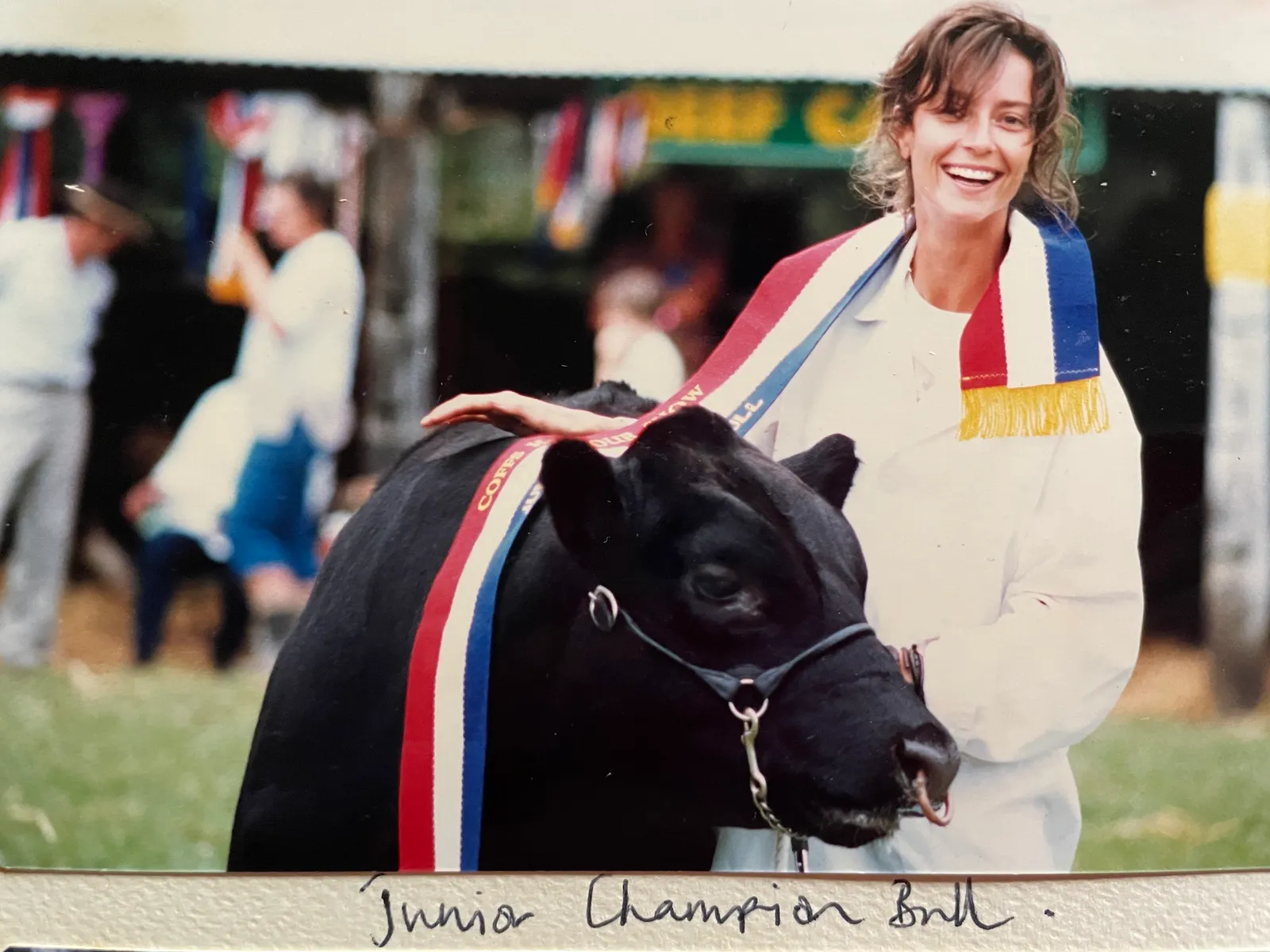 Young Rachel with her Junior Champion Bull at a country show
